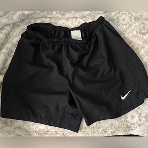Large Women’s black Nike Dri Fit shorts